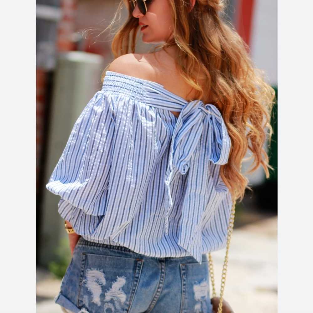 Off-shoulder blue blouse